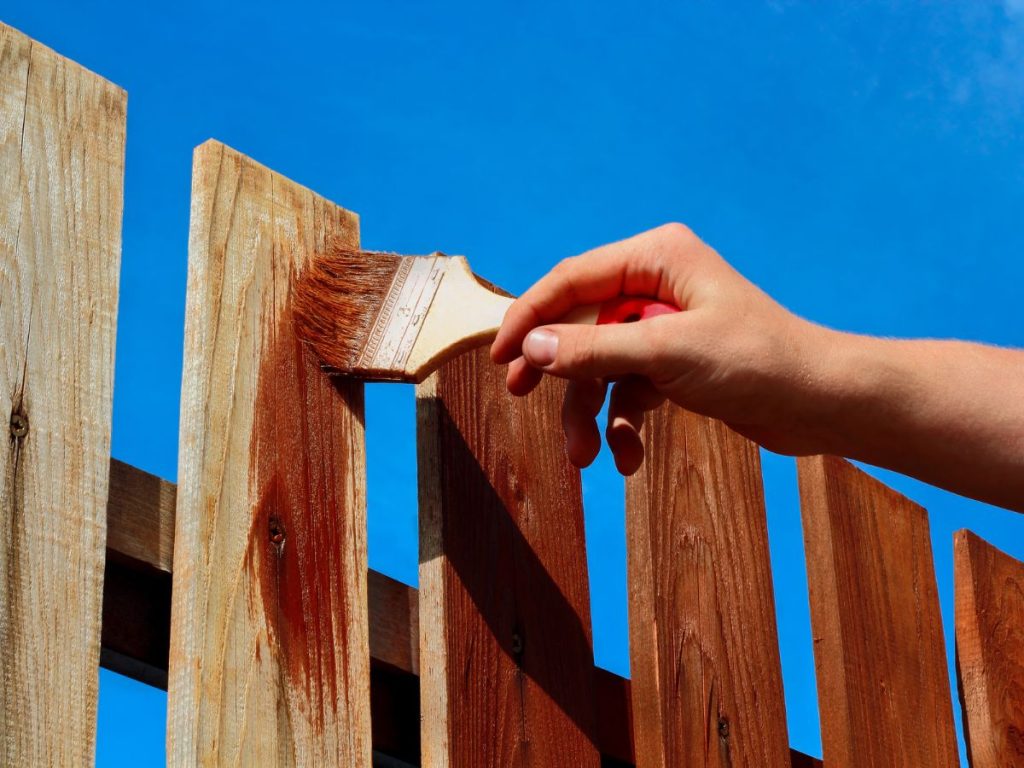 PAINTING OR STAINING YOUR FENCE