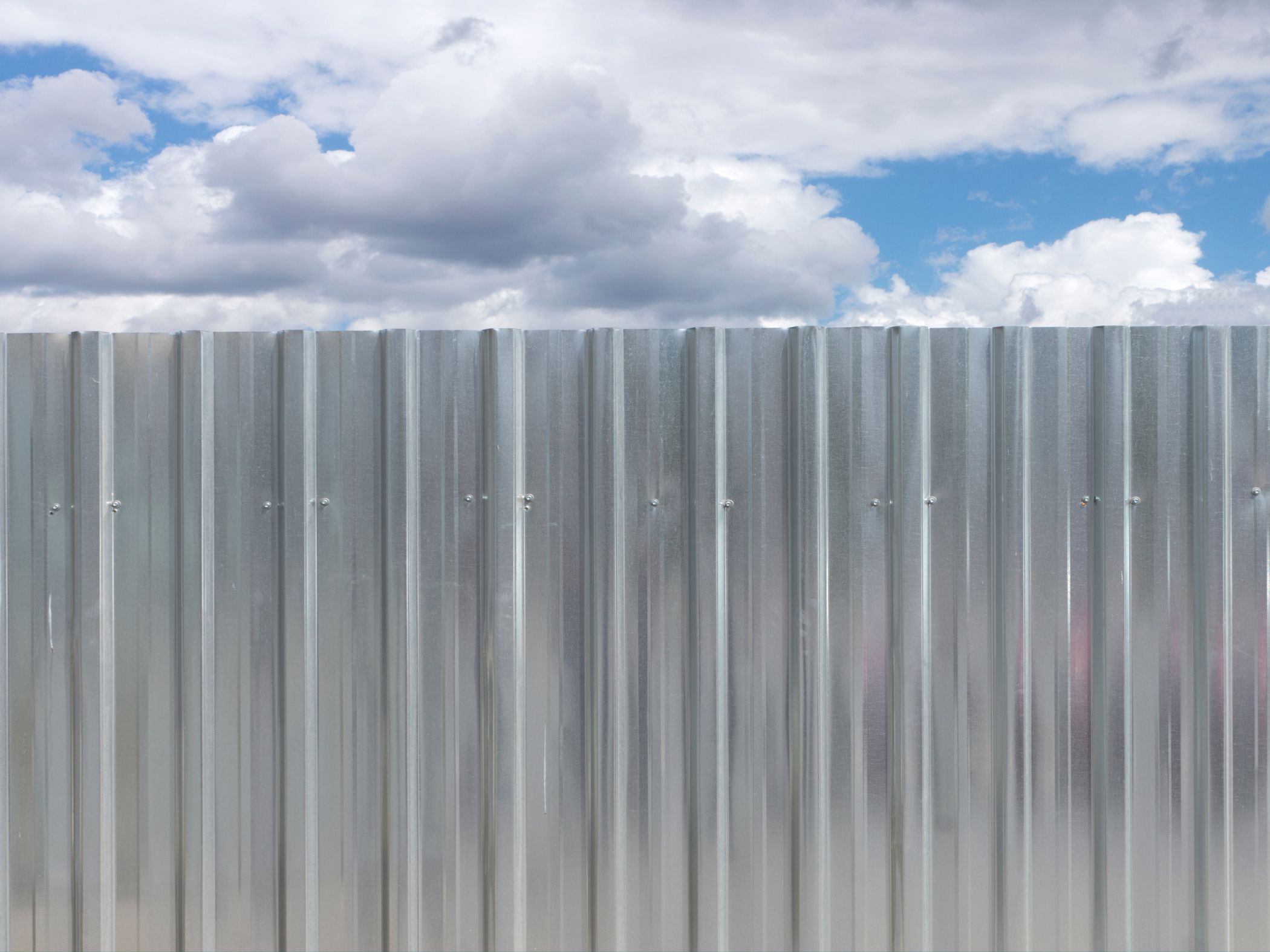 residential corrugated metal fence